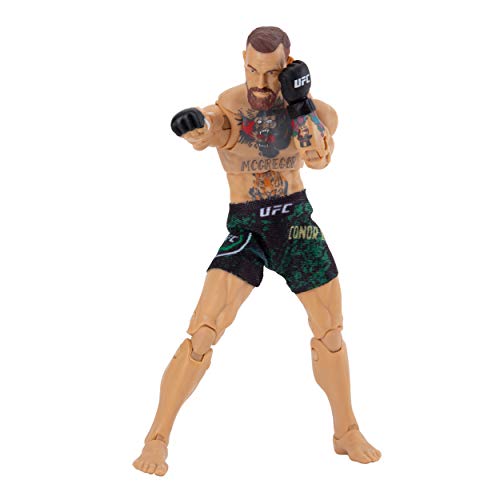 UFC Ultimate Series Limited Edition Conor McGregor, Figura de acción coleccionista de 15.2 cm, pantalones cortos de lucha, cinturón y accesorio de bandera irlandesa