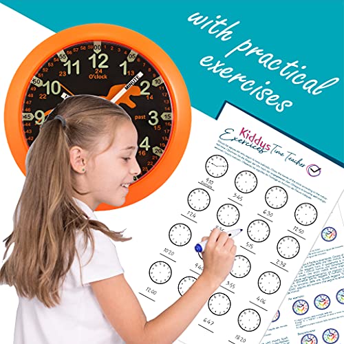 Kiddus Reloj Pedagógico para Niñas y Niños. De Pared, Analógico. Aprende la Hora con Nuestro Fácil Sistema Time Teacher. Ejercicios Incluídos. Mecanismo Silencioso. Manillas en Inglés. Dino