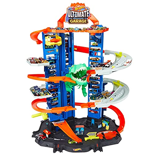 Hot Wheels Megagaraje con T-Rex Robótico - Ascensor y 4 Niveles - Plazas para 100 Coches 1:64 - 2 Coches 1:64 Incluidos - Regalo para Niños de 3+ Años