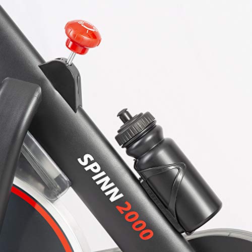 Spinning Bike YM Spinn 2000 - Bicicleta de spinning para casa, resistencia magnética para un pedal flotante, pantalla LCD, Bluetooth + aplicación ZWIFT y KINOMAP, sillín y manillar ajustables
