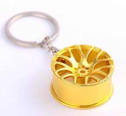 Colgante de llave de llantas de aluminio cromado en oro brillante