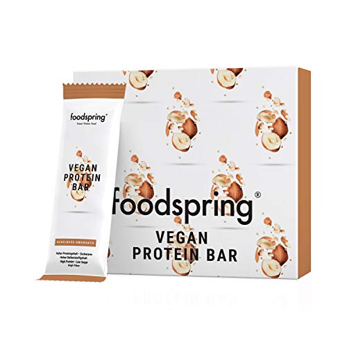 foodspring Barrita Proteica Vegana, 12 x 60g, Avellanas y Amaranto, Barrita proteica de origen vegetal sin aromas artificiales, bajo en azúcar y alto en proteína