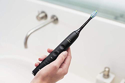 Philips Sonicare DiamondClean Smart HX9901/13 - Cepillo de dientes eléctrico con App de formación personalizada, sensor de presión, 4 modos, 3 intensidades y cargador de vaso, color negro